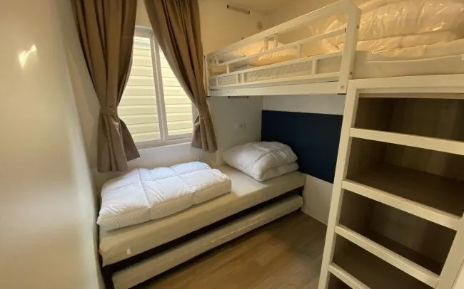 Slaap met onderschuifbed