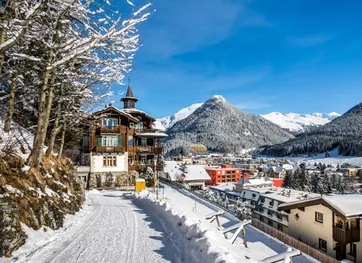 Wood chalet over landscape of Davos, Switzerland